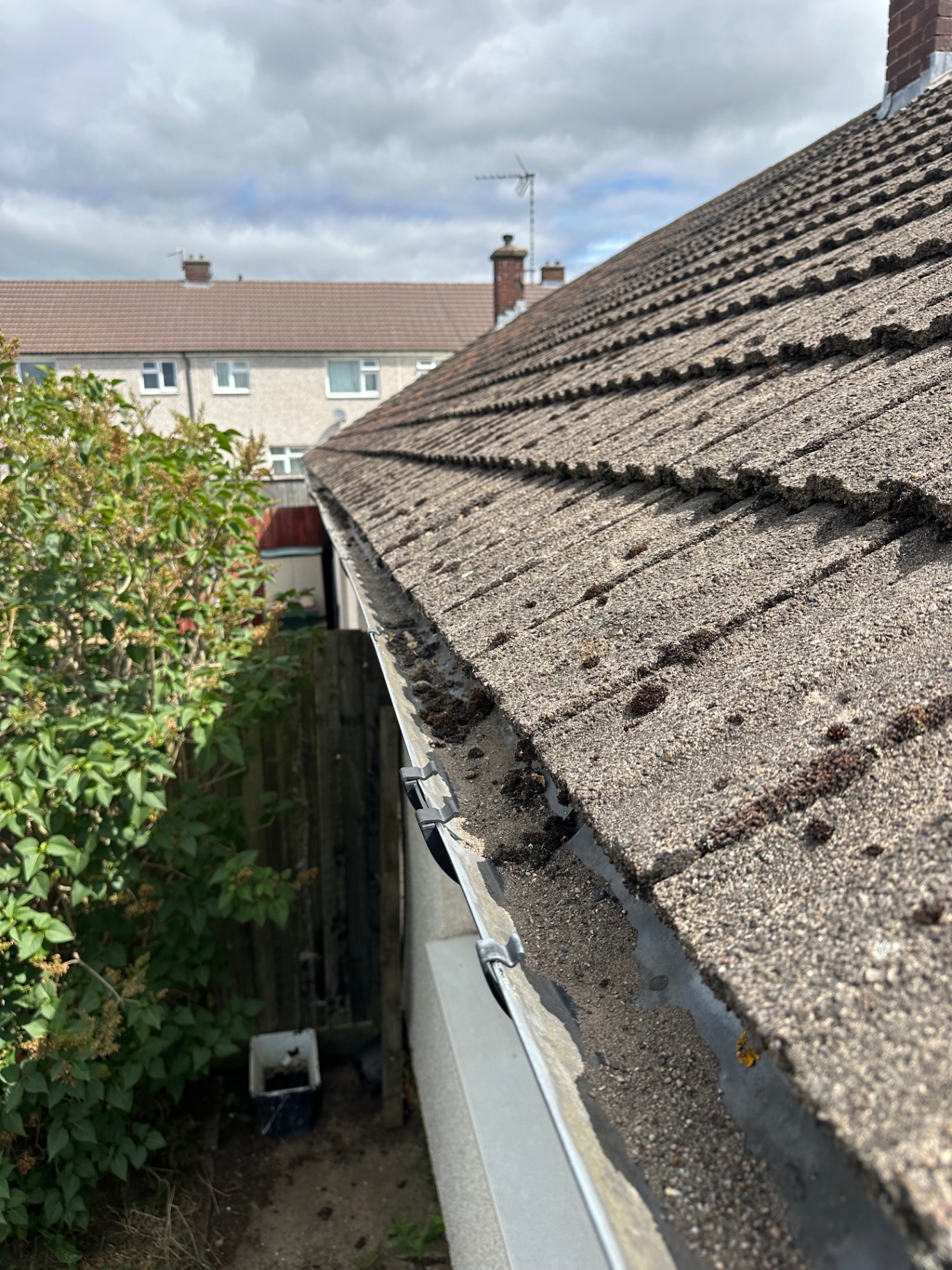 15-year gutter vacuum, side elevation in Coventry · CV4, before pressure washing