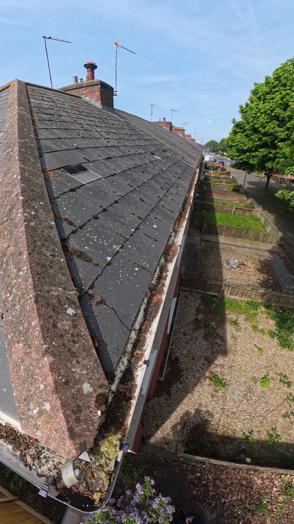 Long terrace gutter clean in Coventry · CV3, before pressure washing