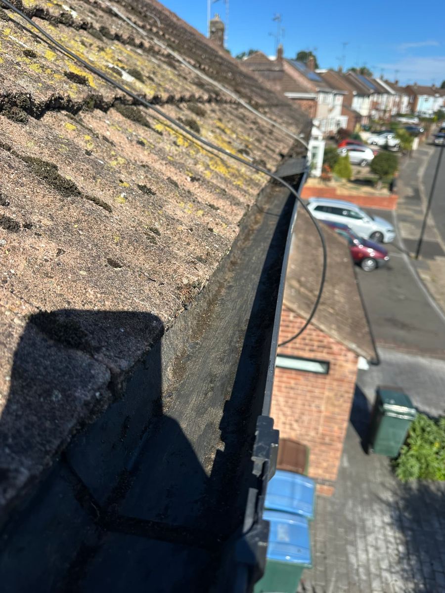 Cleared gutter from live camera inspection, comparison 6