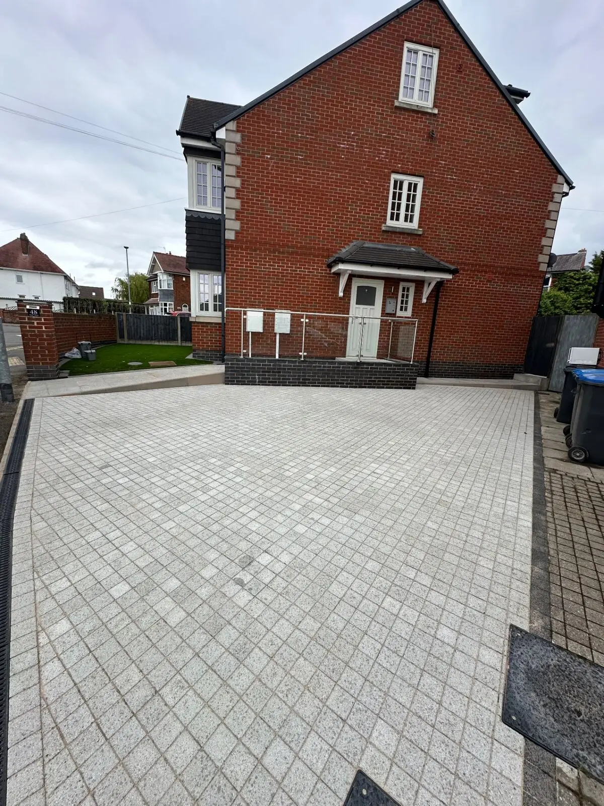 After: Block paved driveway