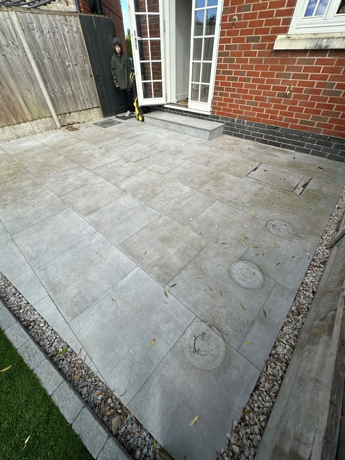 Porcelain patio, side return in Coventry · CV3, before pressure washing